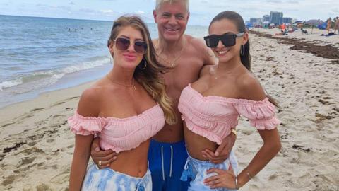 Two busty beach babes come home for a wild bedroom threesome